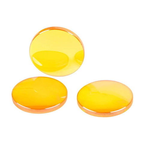 Three 20mm diameter CO2 laser focal lenses with yellow-orange tint.