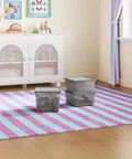 Straight Up Essential Stackable Medium Storage Bins With Secure Lids Hella Neat Gray Plastic Organizer Box For Clothes And Toys in a child's room.