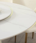 Close-up of Top Shelf 7 Piece Round Marble Dining Table Set Featuring An Easy Glide Lazy Susan Turntable and white chairs.