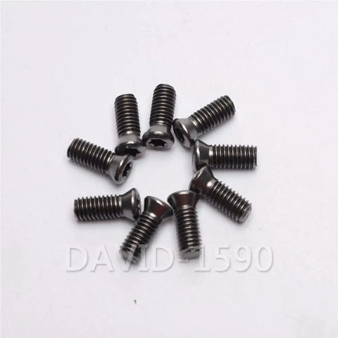 Premium Grade 12.9 Torx Head Machine Screws For CNC Lathe Tool Holders And Carbide Indexable Insert Clamping Bolts arranged in a circle.