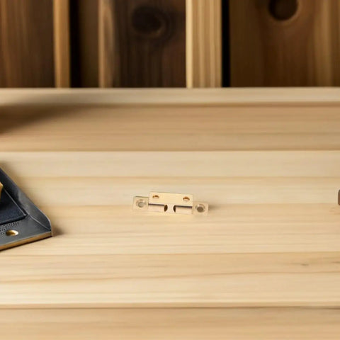 Brass Cabinet Door Catches Magnetic Latches Kit No Fuss Install, showing a latch on a wooden surface, durable furniture hardware