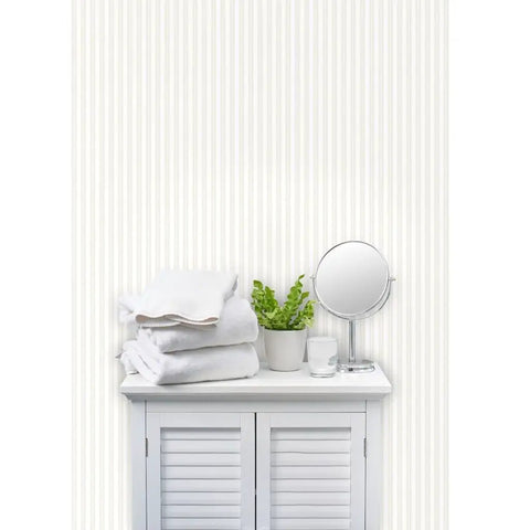 Premium PVC Free Type II Professional Wallpaper Featuring Matte Linen Texture Hella Durable Finish Zero Hassle Paste To Paper Install For Kitchens And Bathrooms Real Deal Quality on a white cabinet with towels.