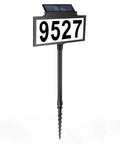 Solar Address Sign With LED Illuminated House Number For Outdoor Use Waterproof Address Plaque For Your Home Yard And Street 135 Degree Adjustable Solar Panel Auto Mode Light On At Night, showing house number 9527 on a stake