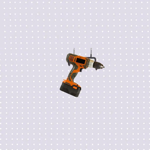 Drill mounted on Six Pack Heavy Duty Pegboard Drill Holder Set With Rubber Coated Tool Hooks For Drills And Power Tools Keeps Garage Or Shed Neat And Within Easy Reach
