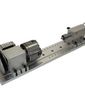 Built Tough 4 Axis CNC Rotary Tailstock With Heavy Duty Mounting Base And Nema 23 Stepper Motor For Slick Machining Projects Paired With A 100Mm Four Jaw Chuck on metal base.
