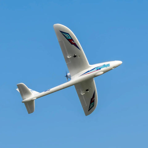 Prodigy 1400mm Wingspan RC Plane With Vector Flight Stabilization System 4 Channel Remote Control Airplane soaring in the sky.