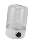 Portable Mini Washing Machine With Rechargeable Power Pocket Sized Laundromat Lightweight Compact Washer on a white background.