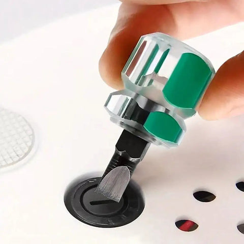 Using mini stubby screwdriver with magnetic tips in tight space, close-up of flat head driver from the Mini Stubby Screwdriver Set With Magnetic Tips For Tight Spaces, Cross And Flat Head Drivers, Non Slip Handle, Portable Pocket Tool Kit For Electronics, Sewing Machines, And Small Home Repairs.