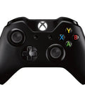 Badass 500GB Xbox Gaming Console Bundle Featuring The Epic Gears Of War Ultimate Edition controller in black with buttons.