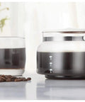 Straight Up Barista Quality Fully Automatic Bean To Cup Coffee And Espresso Maker For Home Office With Built In Grinder Zero Hassle Touch Panel Kitchen Ready Red. Coffee carafe with brewed coffee and cup.