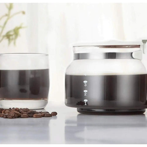 Straight Up Barista Quality Fully Automatic Bean To Cup Coffee And Espresso Maker For Home Office With Built In Grinder Zero Hassle Touch Panel Kitchen Ready Red. Coffee carafe with brewed coffee and cup.