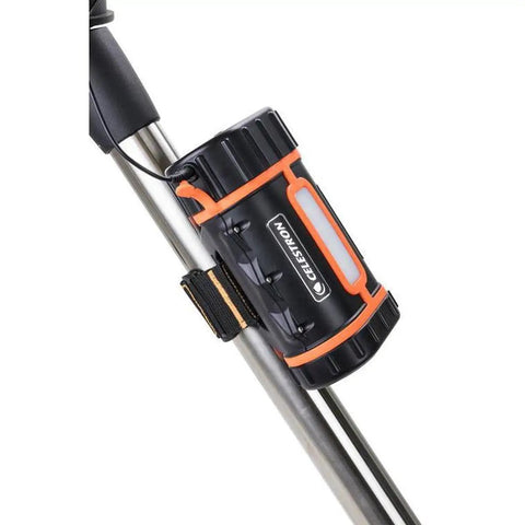 PowerTank Lithium Pro Telescope Battery mounted on tripod leg, portable 12V power supply with USB, LED light and 158.74Wh capacity.