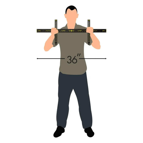 Person holding the Stress Free Wall Hanging Tool Features Built In Level And Measuring Ruler For Dead On Picture Frame Mirror Mounting Zero Guesswork Adjustable 36 Inch Nail Guide Black.