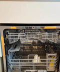 Heavy Duty Full Size Drawer Dishwasher For Bustling Kitchens Quick Wash Cycle with empty stainless steel racks.