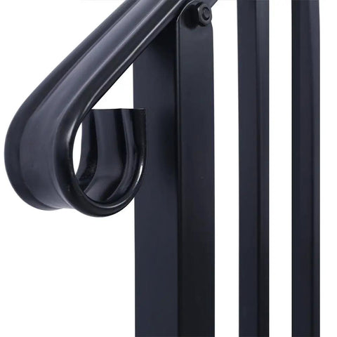 Close-up of the curved top grip of the Badass Wrought Iron Handrail for 3 Step Outdoor Stairs, matte black finish.