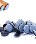 24 Pack 19mm Round Screw-In Furniture Glides With Nail Covers For Chairs And Tables, shown on wood and scattered loose