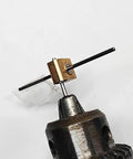 Hella Reliable Micro Worm Gearbox With One Damn Fine 12 To 1 Reduction Ratio seen from above, showcasing metal housing and output shaft.