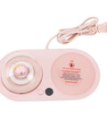 Smart Mug Warmer With Three Heat Levels And 20W Power To Keep Your Favorite Sips Piping Hot with pink ceramic base and power cord.