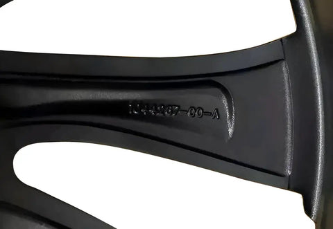Close-up of the interior of Top Shelf Reconditioned Factory Alloy Wheel Rim 20X9 Inches Satin Black with OEM part number.