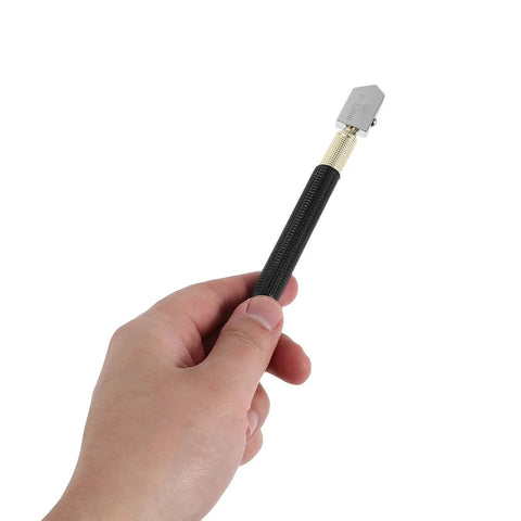Hand holding Pencil Style Glass Cutter Kit With 2 Spare Blades For Craft Projects And Window Glass Cutting Tools, 6-12mm