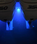 SeaBlaze Mini Underwater LED Boat Lights Pair 700 Lumens Marine Grade Blue illuminating water below boat engines at night