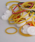 84 Type Plastic Gears Set With Belt Pulleys For DC Motor DIY Robots And Model Toys, Includes Massive 40 Gear Wheels, 40 Rubber Bands, And 4 Rubber Drive Belts For Versatile Gear Train Projects. Close-up of various gear wheels and rubber bands from the set.
