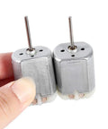 Person holding Beefy Torque 12V DC Door Lock Actuator Motor With 22mm D Shaft For Auto Power Lock Replacement Easy Install DIY Car Upgrade For FC-280SC-20150 1 Pair Ready To Install