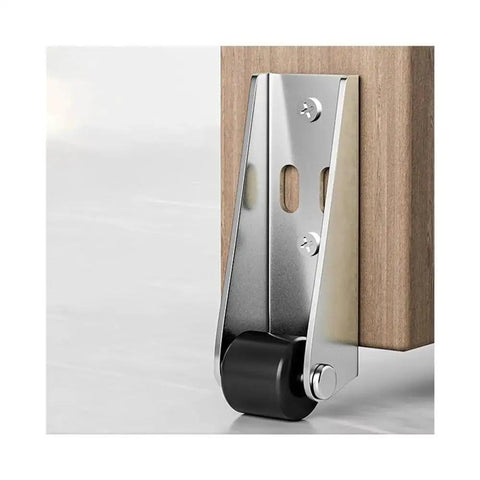Heavy Duty Anti Sagging Gate Stabilizer Roller Wheel with slick sealed bearings attached to a wooden post.