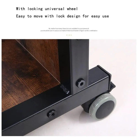 Close-up of locking wheel on Height Adjustable Overbed Table With Smooth Rolling Wheels And Built In Storage Trays For Sofa Bedside Use Solid Brown Laptop Stand.
