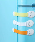 10 Pack Kid Proof Safety Locks For Cabinets And Drawers No Tools Needed Self Adhesive Refrigerator Locks in assorted colors on blue fridge