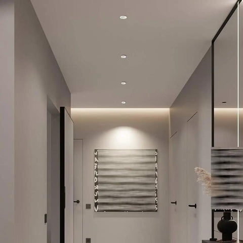 MXJCKSOQ 2 Pack LED Recessed Retrofit Downlight,7W, 12W, 18W LED Ceiling Light installed in a modern hallway.