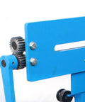 Close-up of manual bead roller kit with 1.2mm gear drive, showing steel gears and bench-mounted structure for sheet metal work.