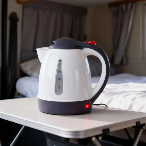 12V Car Electric Kettle With Auto Shut Off Portable Water Heater For Long Distance Runs And Weekend Getaways Direct Socket Insert on a table.