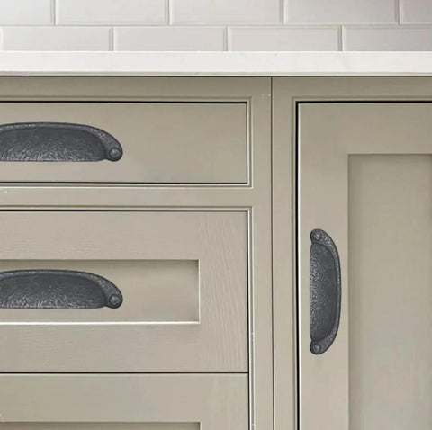 Close-up of cabinet with 10 Pack 3 Inch Hole Center Black Iron Cup Drawer Pulls for Cabinets and Dressers installed