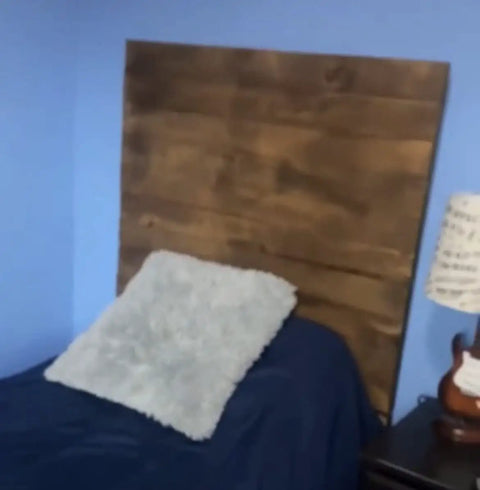 No Brainer Walnut Aging Wood Stain In 5 Gallon Pails transforms rough cut lumber into a warm brown headboard in bedroom.