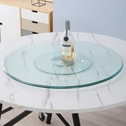 Heavy Duty 43 Inch Lazy Susan Turntable Smooth 360 Rotating Tempered Glass Dining Table Serving Tray on a marble table.