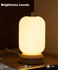 Cozy Small Table Lamp For Bedroom And Nightstand, Kid Friendly Minimalist Solid Wood Desk Lamp shown with five brightness levels