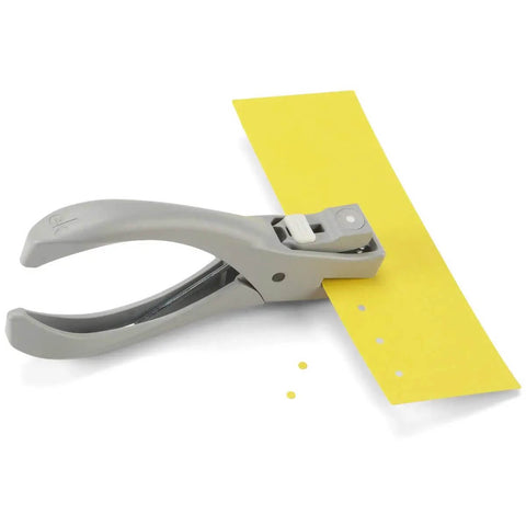 Heavy Duty One Eighth Inch Circle Craft Punch For Cardstock Chipboard And Lightweight Metal With Locking Handle in use on yellow sheet