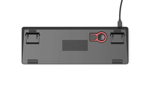 Bottom view of sleek black metal plate for hot swap mechanical keyboard kit featuring USB C connection and adjustable feet.