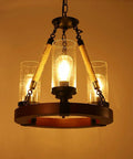 Farmhouse Wagon Wheel Ceiling Chandelier With Wood Frame And Seeded Glass Shades, rustic lighting with three glowing bulbs
