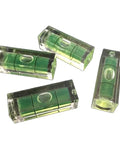 4Pcs 10x10x29mm Universal Square Bubble Spirit Level Tripod Measuring Camera with green bubbles and clear casing.