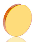CO2 laser lens disk with orange rim and yellow optical surface.