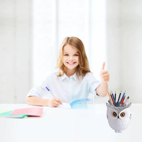 Girl giving thumbs up beside Dope Owl Pen Holder And Desk Organizer For Pens And Pencils, White Ceramic Owl Container