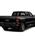 Rear view of GMC Sierra truck with GM Short Antenna For Silverado Sierra 1999-2026 Direct Replacement Mast In Matte Black 3.6 Inch Aluminum