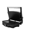 Imusa Electric Panini Press Griddle With Non Stick Cast Aluminum Plates Adjustable Thermostat Control for gourmet sandwiches, open angle view.