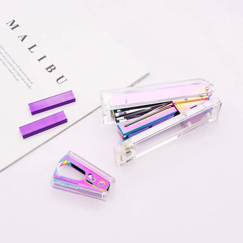 Clear Rainbow Acrylic Stapler And Staples Remover Set For Your Desk Stainless Steel Rod Sleek Executive Style Durable ABS Build A Must Have Desk Gadget For Home Office And Busy Workdays on a white surface