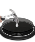 Dead Nuts Accurate Smart Body Fat Scale With Tank Tough Tempered Glass Platform under a hammer, showing durability and strength.