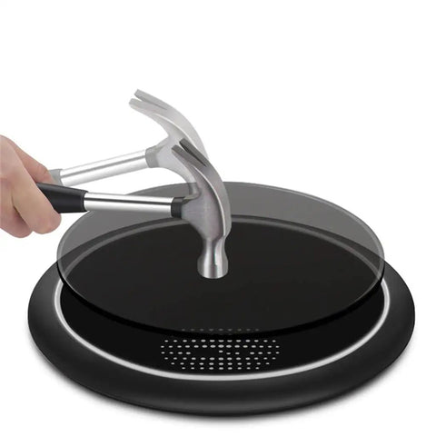 Dead Nuts Accurate Smart Body Fat Scale With Tank Tough Tempered Glass Platform under a hammer, showing durability and strength.