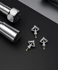 Heavy Duty Drywall Anchors Kit With Butterfly Hollow Wall Anchors And Screws shown with metal rods on black surface