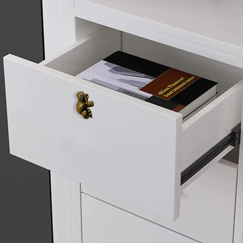 Six Piece Frog Shaped Cabinet Handles Crafted From Solid Zinc Alloy Rust Proof Drawer Pulls on white drawer with book.